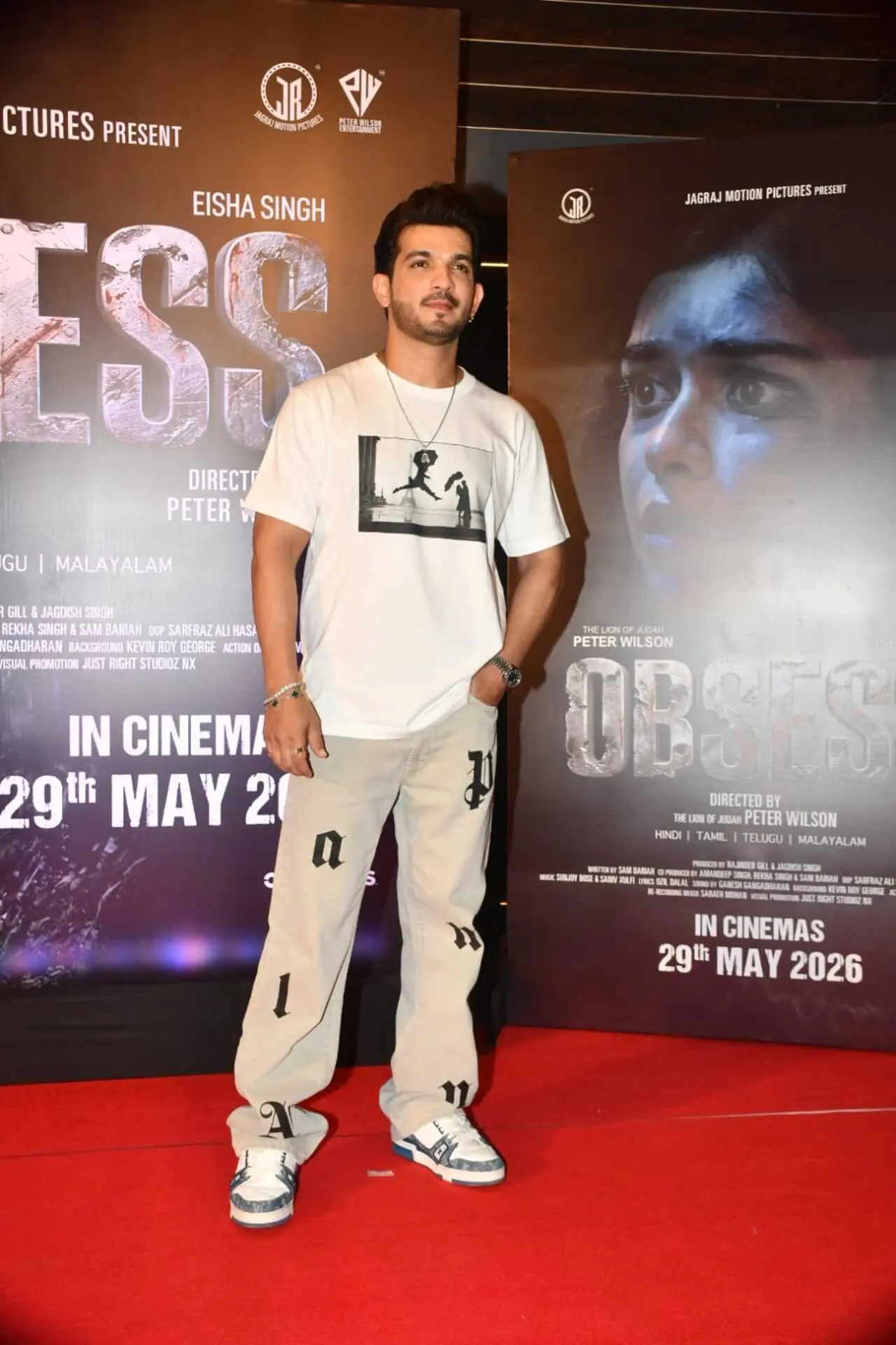 Arjun Bijlani arrived at the screening in a relaxed casual look. The actor sported a white graphic T-shirt paired with matching joggers and sneakers. Arjun Bijlani arrived at the screening in a relaxed casual look. The actor sported a white graphic T-shirt paired with matching joggers and sneakers.
